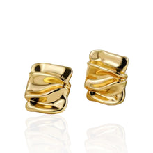 Load image into Gallery viewer, Close-up of textured square earrings in 18k gold-plated sterling silver.
