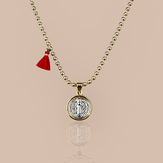 Gold beaded chain necklace with a two-tone Saint Benedict medal in 18k gold plating, showing Saint Benedict and the cross symbol.