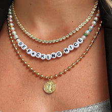 Load image into Gallery viewer, Woman wearing 17&quot; Be Nice Freshwater Pearl and multicolor beaded necklace.
