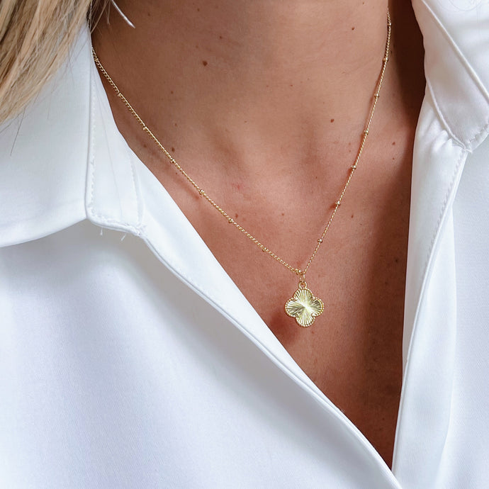 Clover Necklace featuring a four-leaf clover charm symbolizing luck, positivity, and fortune. Elegant and meaningful jewelry.






