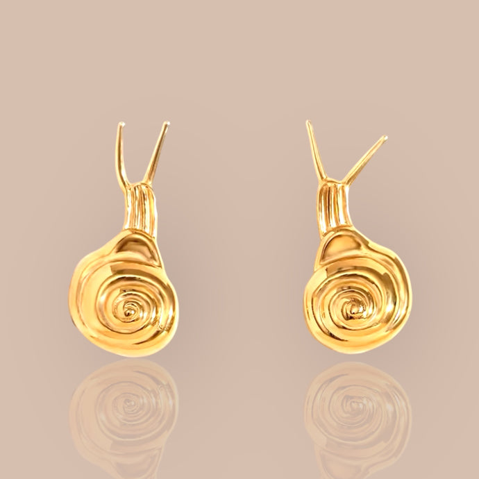 Adorable snail earrings made from 18k gold plated over stainless steel, showcasing playful and elegant design.