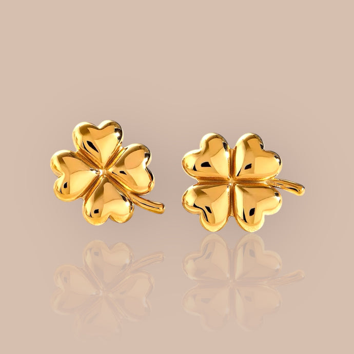 18k gold plated four leaf clover stud earrings made from stainless steel, symbolizing luck and charm.