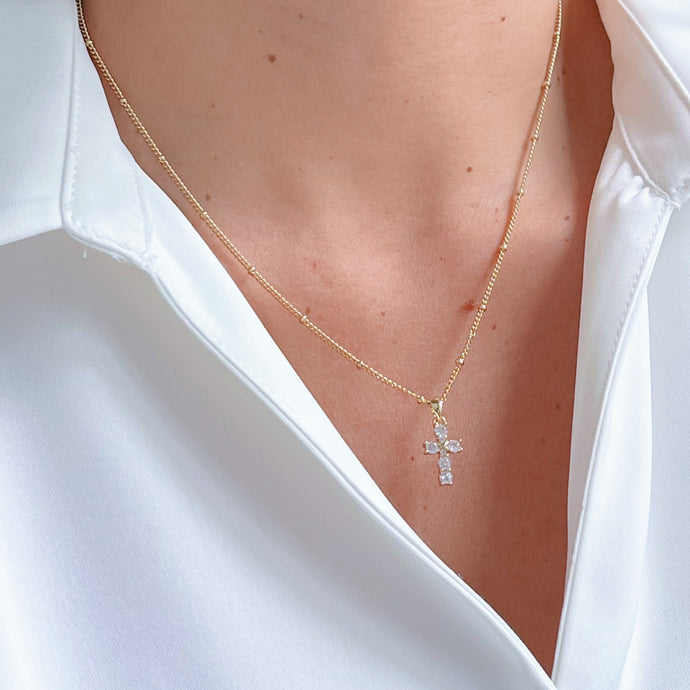 Dainty Cz Cross Necklace with sparkling cubic zirconia, a timeless and elegant symbol of faith. Perfect for layering or wearing solo.