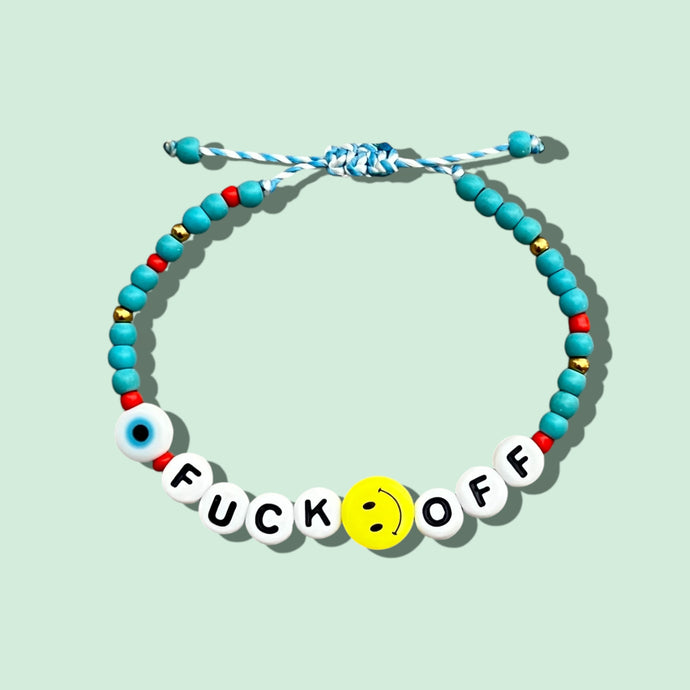 Close-up of F*ck Off Beaded Bracelet showcasing turquoise and smiley face beads.