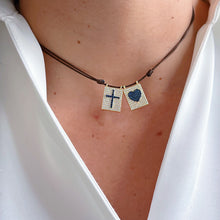 Load image into Gallery viewer, Close-up of CZ Double Scapular Cord Necklace with heart and cross charms.
