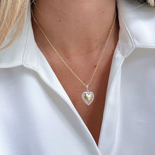 Load image into Gallery viewer, Two-Tone Cz Heart Necklace with a heart-shaped pendant encircled by cubic zirconia, perfect for elegant and timeless style.
