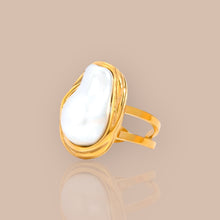 Load image into Gallery viewer, Close-up of Baroque pearl ring showcasing its unique shape and gold-plated band.
