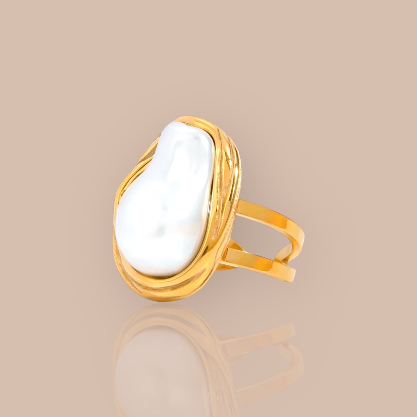 Close-up of Baroque pearl ring showcasing its unique shape and gold-plated band.