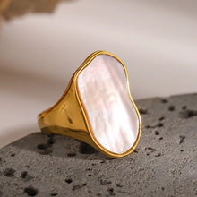 Load image into Gallery viewer, Oversized mother of pearl ring on a flat neutral background
