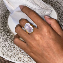 Load image into Gallery viewer, Statement ring with mother of pearl centerpiece styled on hand
