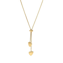 Load image into Gallery viewer, Close-up of the lariat double heart necklace in gold, showing fine details.
