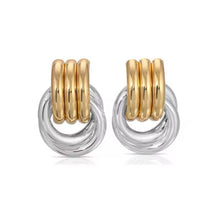 Load image into Gallery viewer, Close-up of two tone open circle earrings, lightweight and hypoallergenic.
